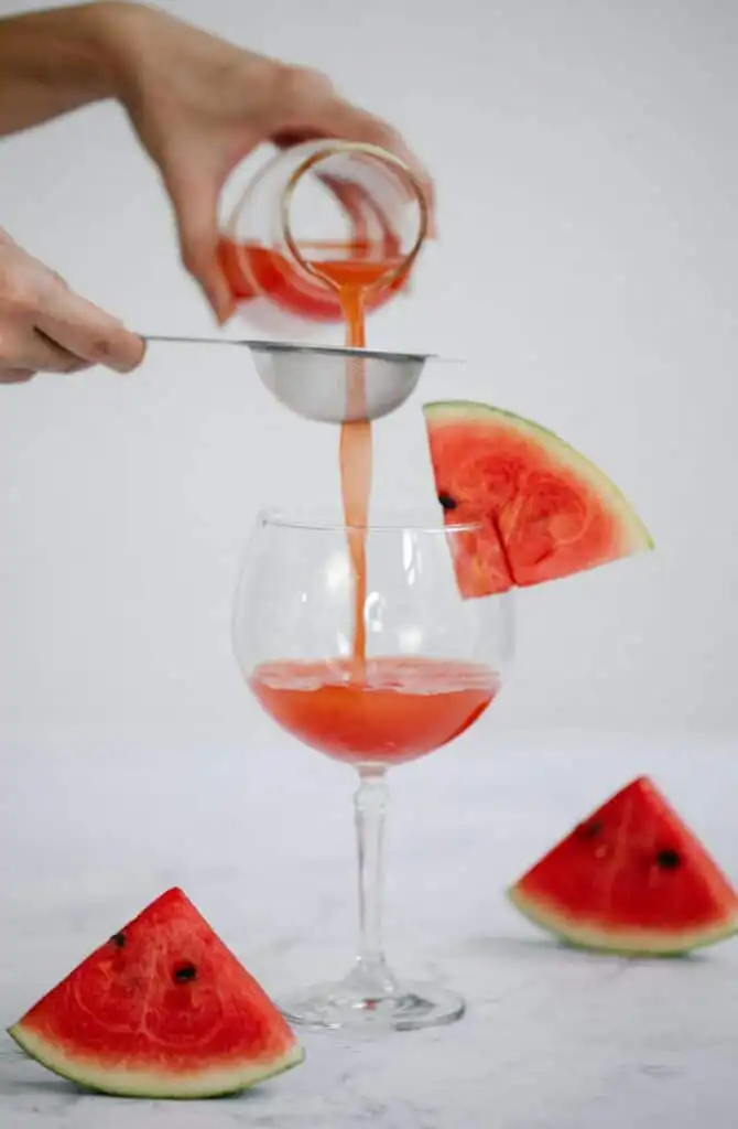 Watermelon juice served cold with lime