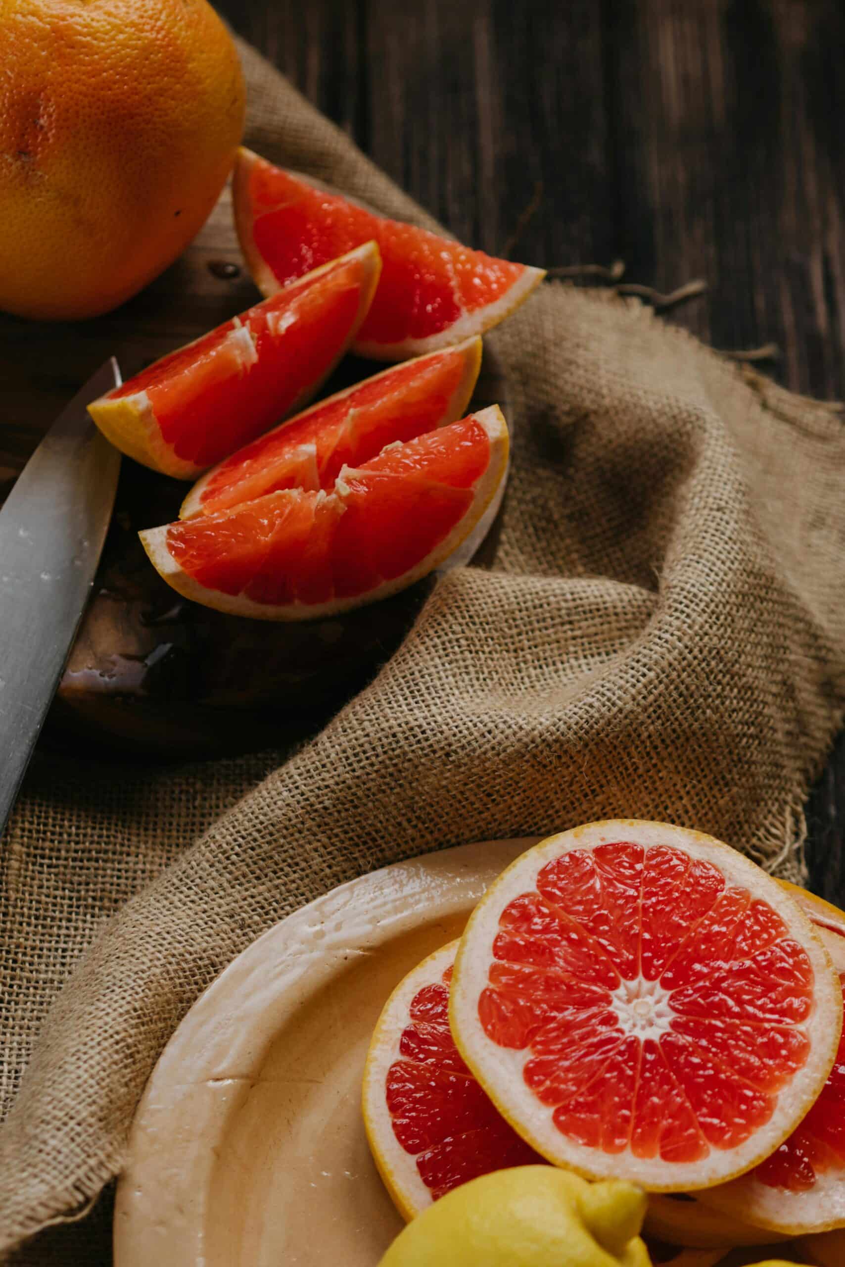 Freshly squeezed grapefruit juice grapefruit on a kitchen table