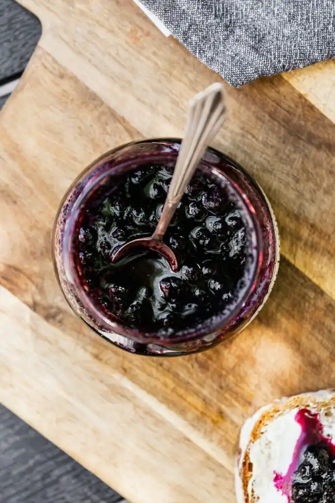 Canned cranberry sauce warming in saucepan