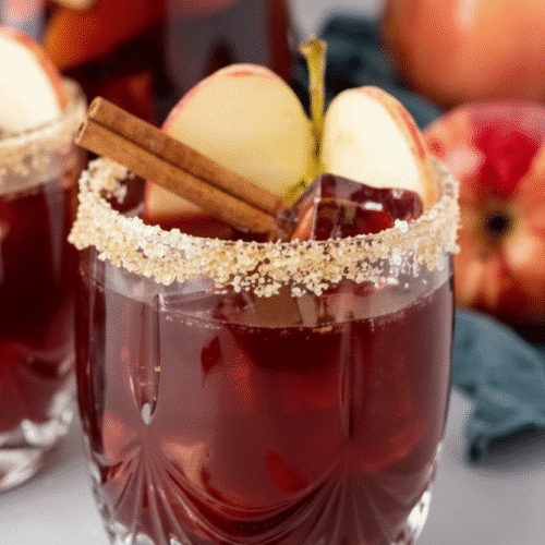 pitcher-of-spiced-apple-cider-sangria-with-apples-and-cinnamon