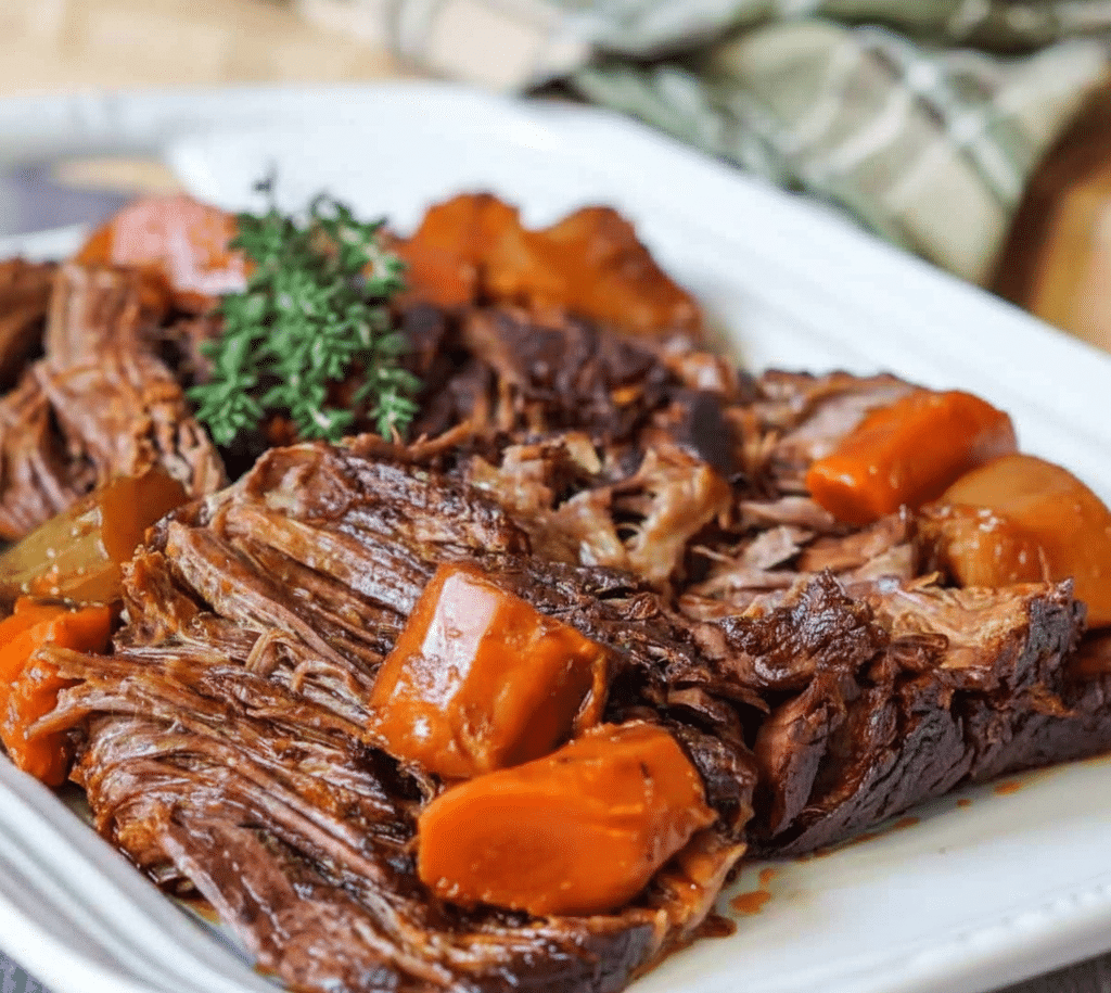 Juicy French Onion Pot Roast 4 Delicious French onion pot roast served with herbs and a side of vegetables. serving