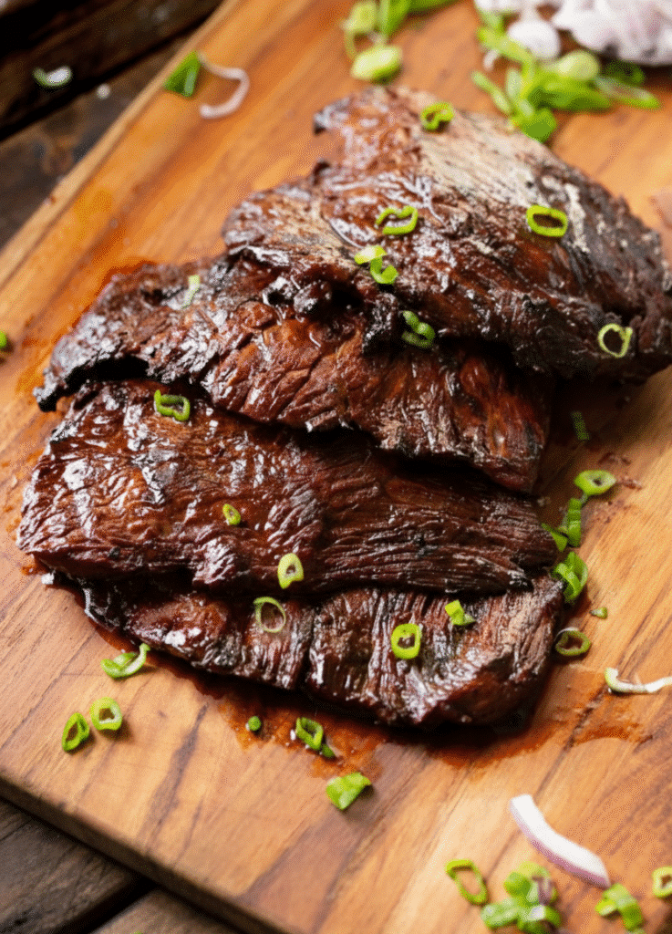 Delicious sizzling Chinese pepper steak with onions served on a plate serving