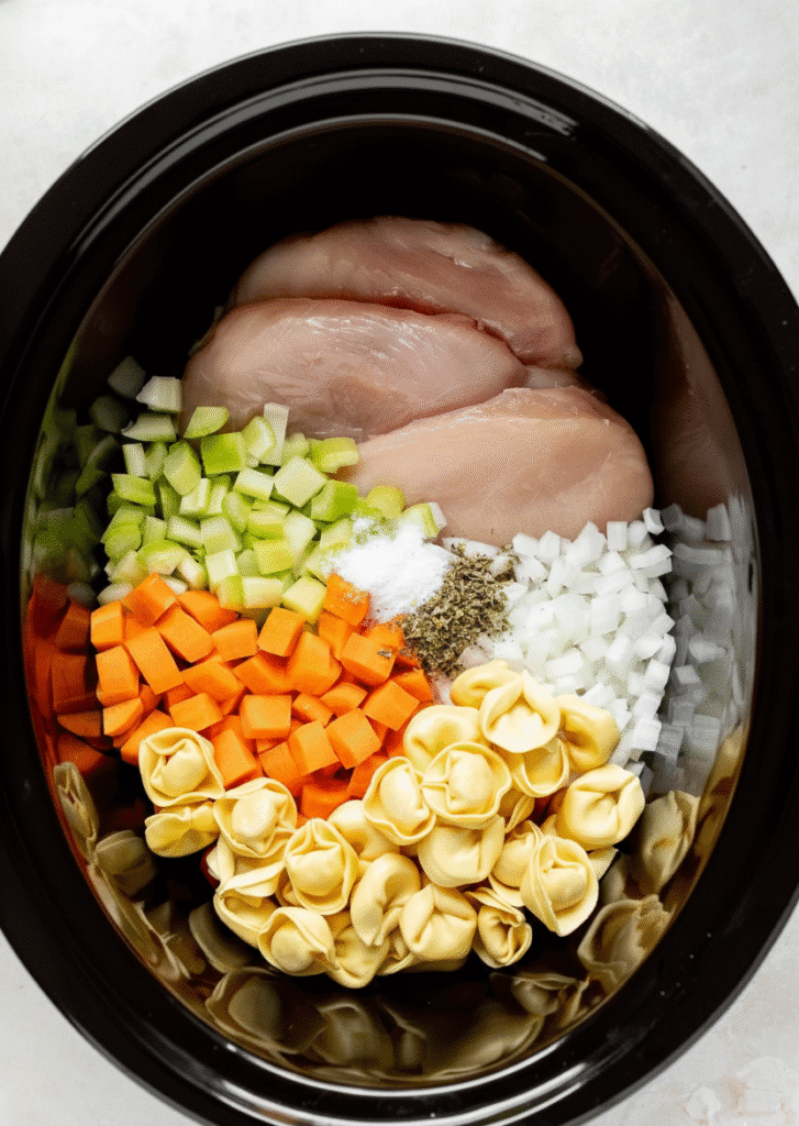 Delicious CrockPot Chicken Tortellini served in a bowl, easy and quick meal. ingridients