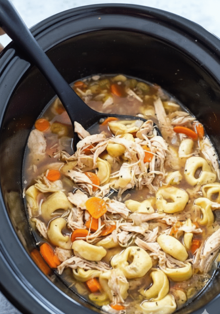 Delicious CrockPot Chicken Tortellini served in a bowl, easy and quick meal. 