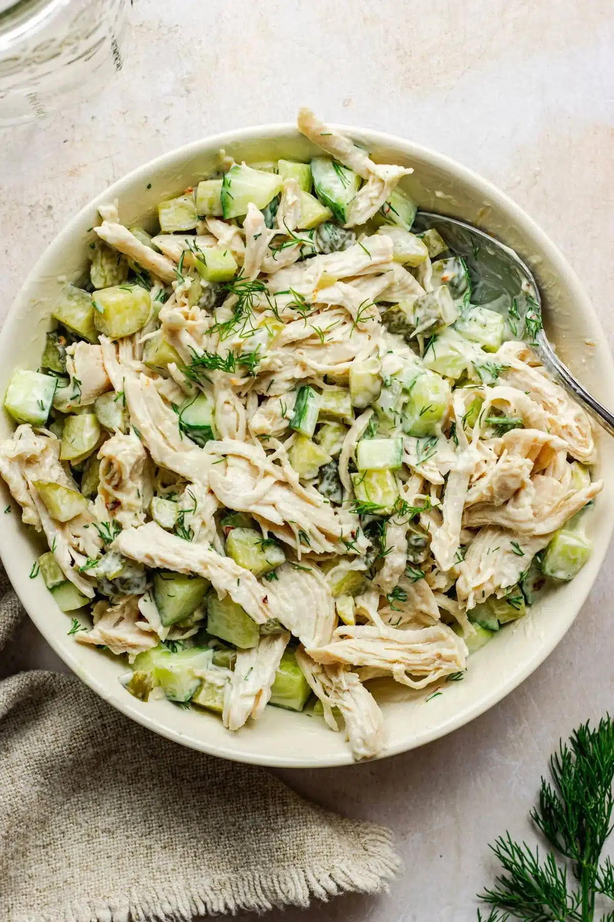 Dill Pickle Chicken Salad 1 A delicious bowl of Dill Pickle Chicken Salad with pickles and chicken.