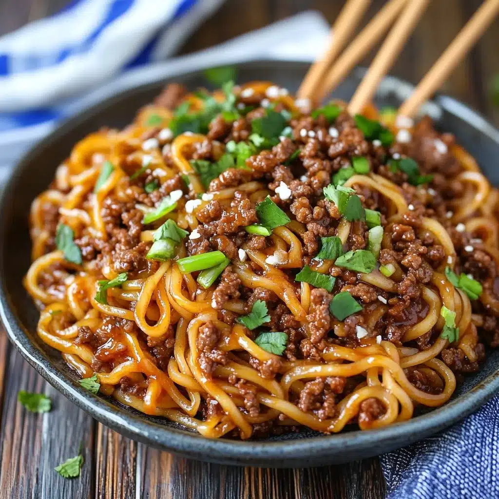 Delicious Mongolian Ground Beef Noodles served in a bowl with herbs and spices.