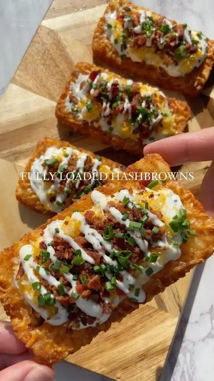 crispy hashbrowns loaded with all your favorite loaded baked potato toppings 1 Crispy loaded hashbrowns with baked potato toppings, ideal for snacks or appetizers.