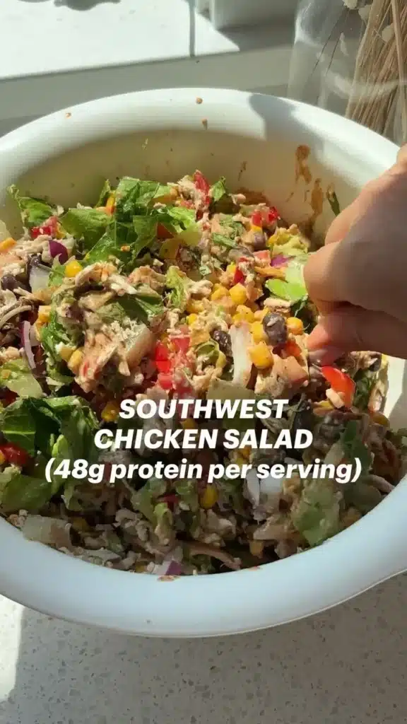 Delicious Southwest Chicken Salad with grilled chicken, beans, corn, and avocado.