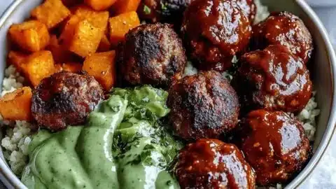 Delicious barbecue meatball bowls with creamy avocado sauce
