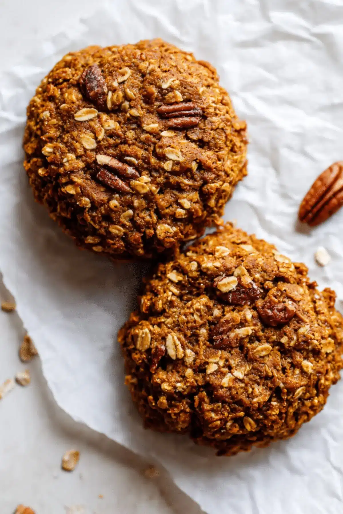 Cinnamon sweet potato breakfast cookies on a plate with spices
