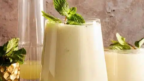 Refreshing Egyptian Mint Lemonade (Limonana) served in a glass with mint leaves.