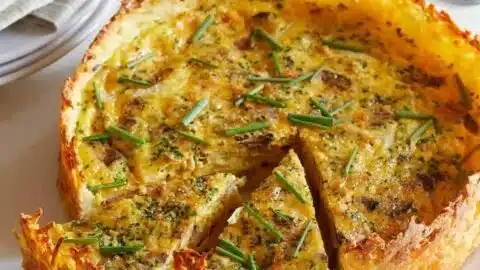 Hash Brown Crust Bacon and Cheddar Quiche 2 Hash Brown Crust Bacon and Cheddar Quiche served on a plate