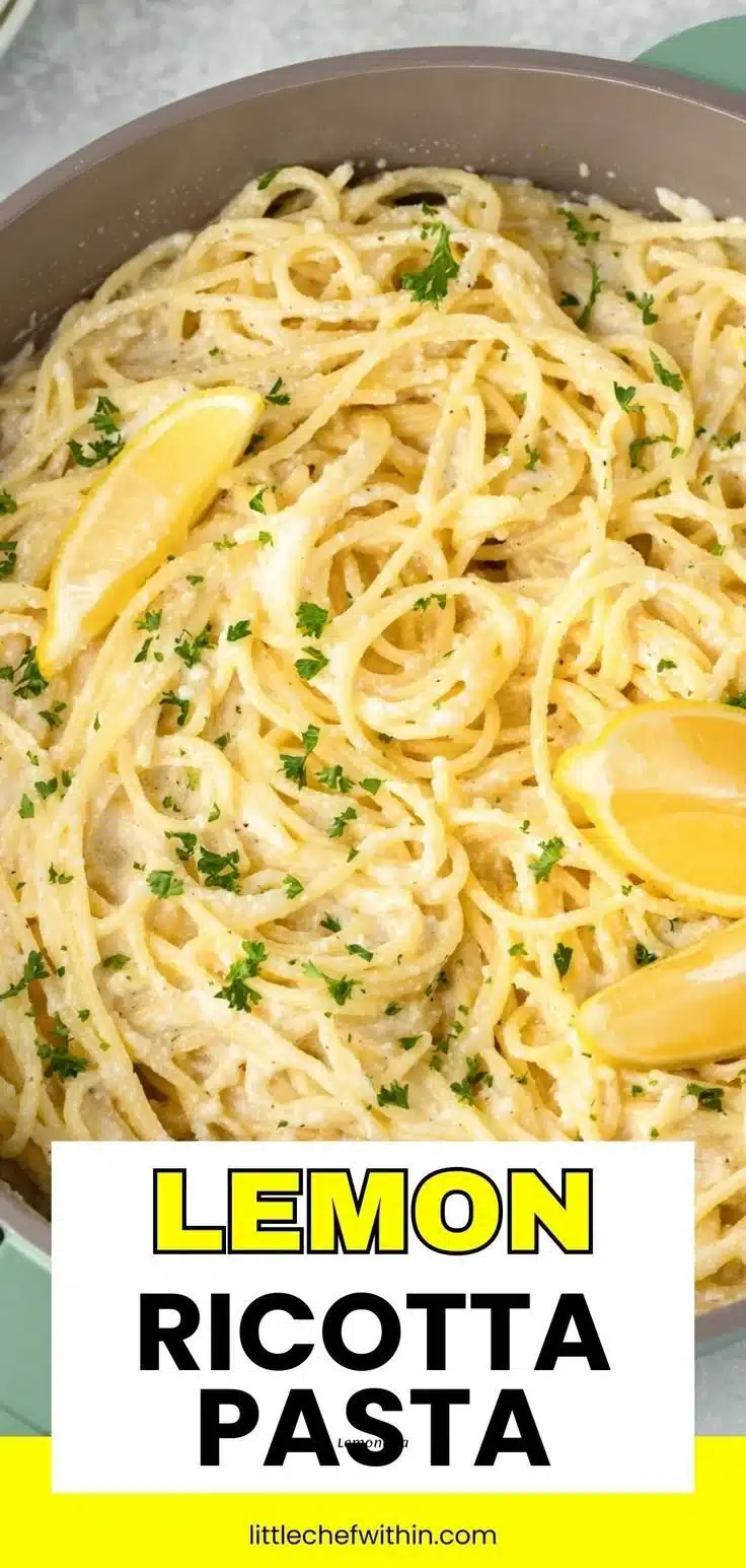 Serving of Lemon Ricotta Pasta garnished with fresh herbs and lemon zest.