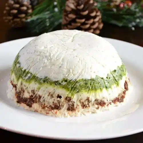 Pesto and Sun-Dried Tomato Cheese Torta, a festive holiday cheese ball