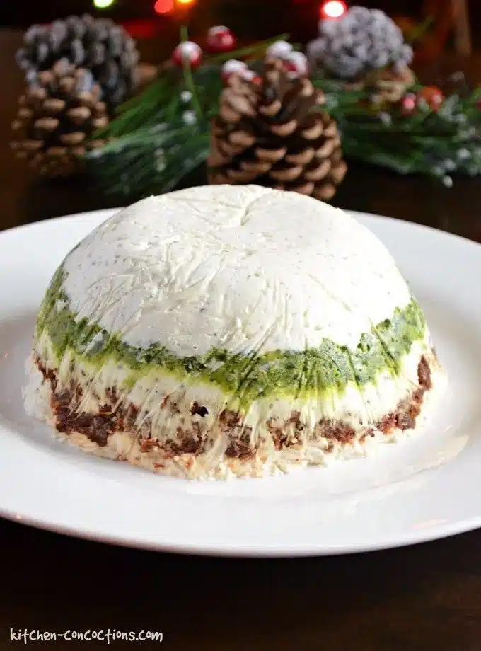 Pesto and Sun-Dried Tomato Cheese Torta, a festive holiday cheese ball