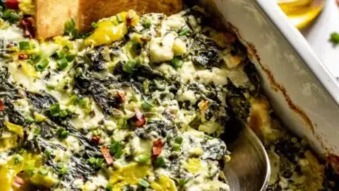 Spinach and Pepperoncini Baked Feta Dip 2 Creamy spinach and pepperoncini baked feta dip served in a bowl with bread
