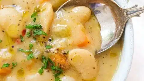 Butter Bean Soup 2 A hearty bowl of butter bean soup garnished with fresh herbs