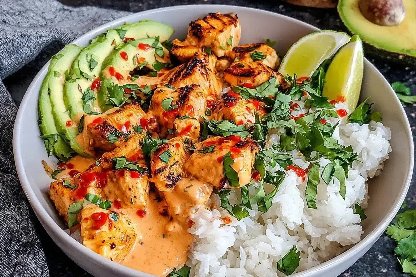 Coconut Chicken Rice Bowl 1 Delicious Coconut Chicken Rice Bowl with fresh vegetables and coconut flavor.