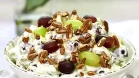 Creamy Southern grape salad with pecans served in a bowl
