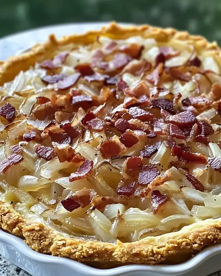Delicious slice of German Onion Pie served on a plate