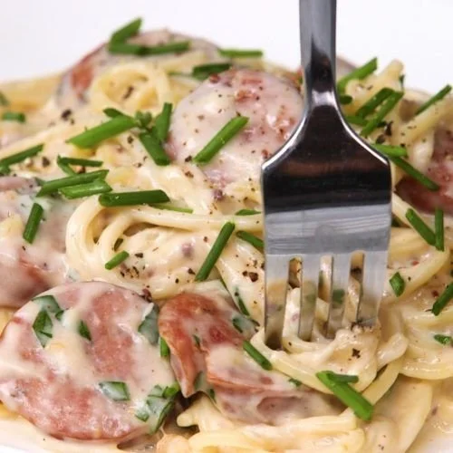 Delicious German Spaghetti served with traditional toppings and herbs