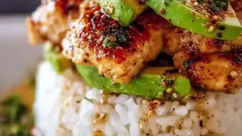 Honey Lime Chicken & Avocado Rice Stack 2 Honey Lime Chicken served with Avocado Rice Stack for a fresh and zesty meal.