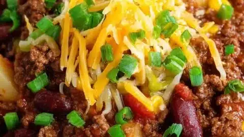 Slow Cooker Cowboy Casserole 2 Delicious slow cooker cowboy casserole topped with cheese and veggies
