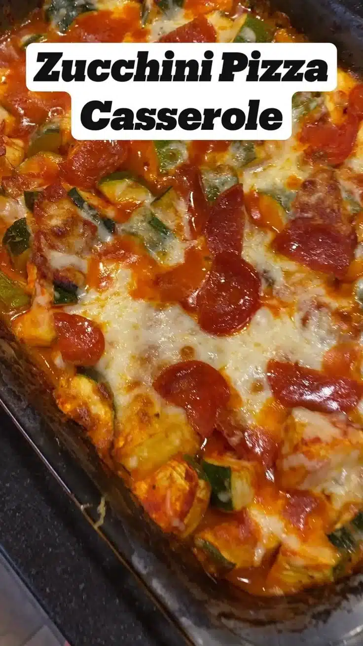 Slice of Zucchini Pizza Casserole topped with cheese and pepperoni