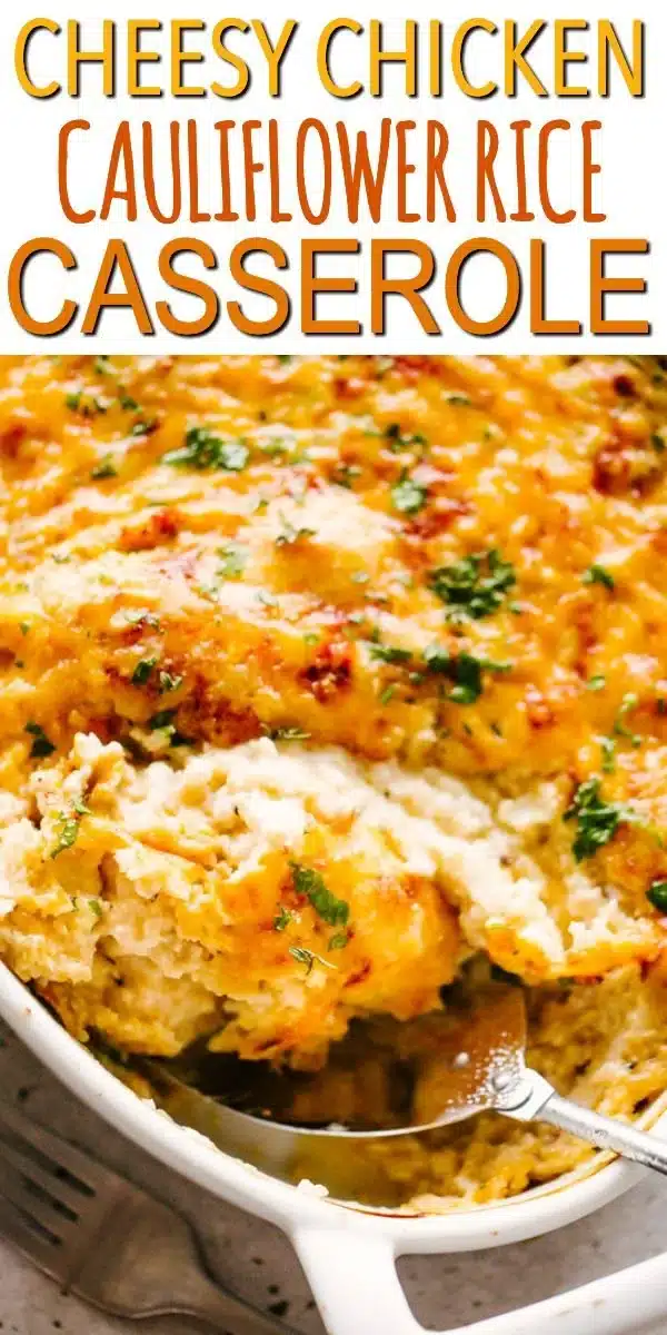 Cheesy Chicken and Cauliflower Rice Casserole topped with cheese and herbs.
