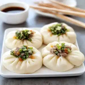 Gluten free bao - steamed Chinese meat buns filled with savory ingredients.
