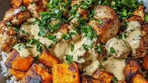 Hearty chicken and sweet potato bowls served in a rustic bowl for cozy nights.