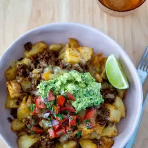 Loaded Potato Taco Bowl 2 Loaded Potato Taco Bowl with toppings including cheese and salsa