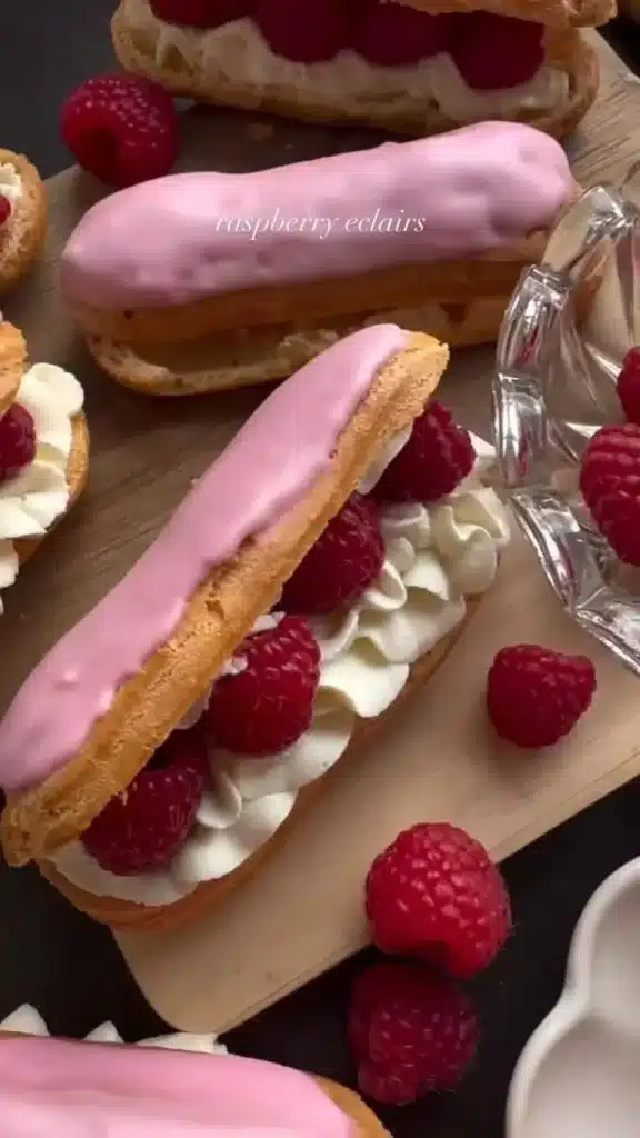Delicious raspberry eclairs filled with creamy raspberry filling