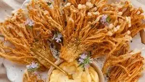 Crispy fried enoki mushrooms served as a tasty appetizer.