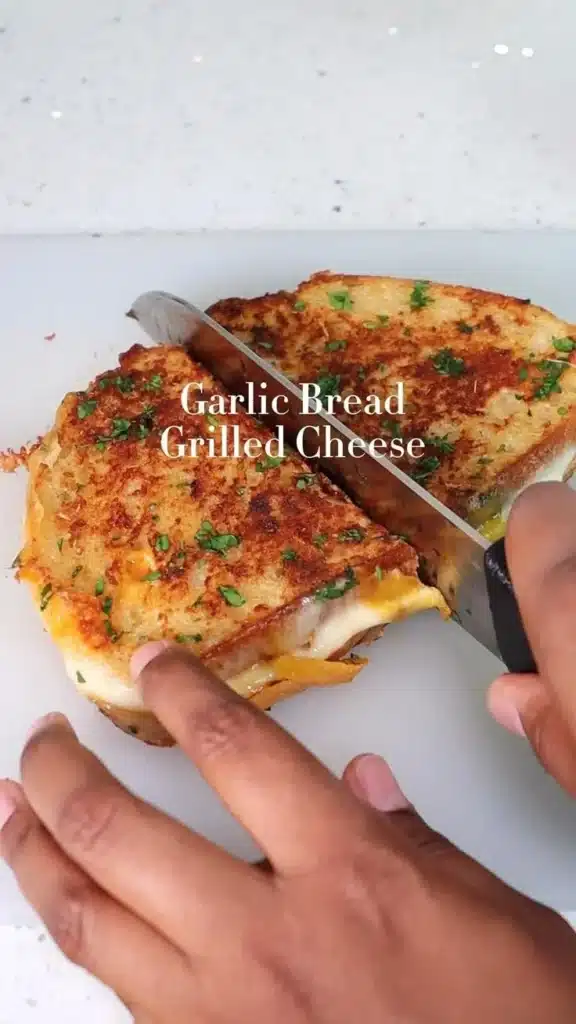 Garlic Bread Grilled Cheese Sandwich with melted cheese and crispy garlic crust