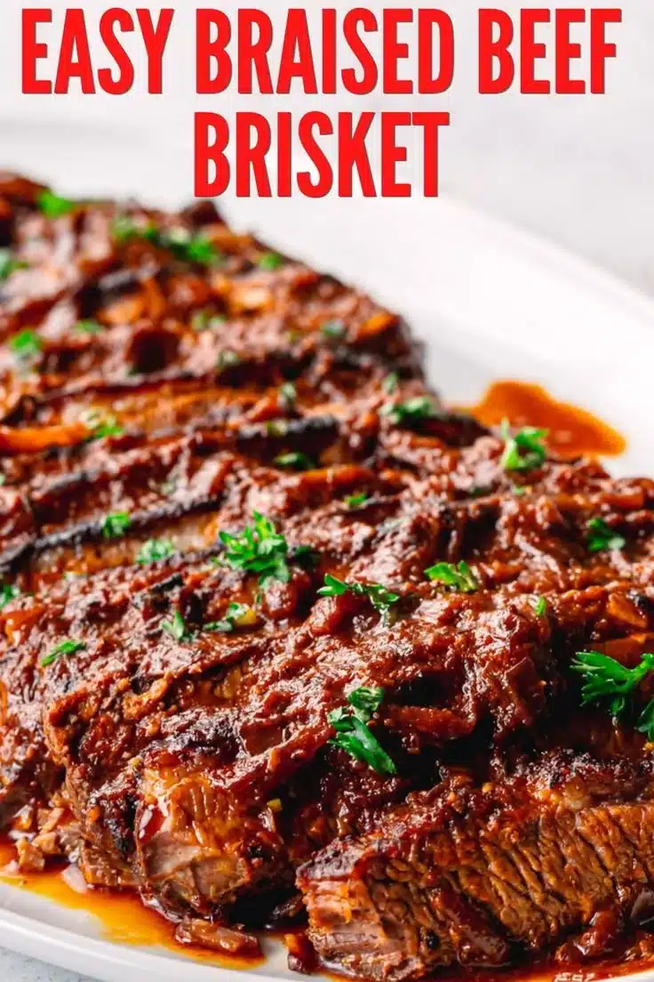 Tender braised beef brisket served with vegetables on a platter
